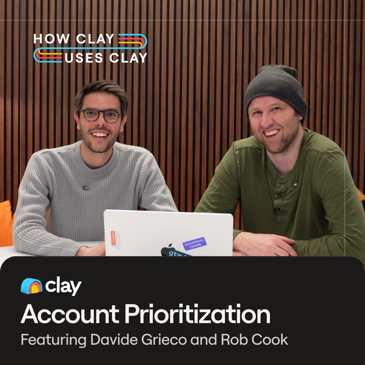 Clay ad for "How Clay Uses Clay" series showing two men smiling at a laptop with wood panel backdrop. Text reads: "Account Prioritization featuring Davide Grieco and Rob Cook."